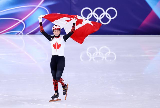 (260216) -- MILAN, Feb. 16, 2026 (Xinhua) -- Courtney Sarault of Canada celebrates after the short track speed skating women's 1000m final A at the Milan-Cortina 2026 Olympic Winter Games in Milan, Italy, Feb. 16, 2026. (Xinhua/Chen Yichen)