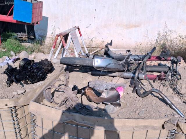 (260216) -- BANNU, Feb. 16, 2026 (Xinhua) -- This photo taken on Feb. 16, 2026 with a mobile phone shows a destroyed motorbike at the blast site in Bannu district of Khyber Pakhtunkhwa province, Pakistan.
  At least two people, including a child, were killed and 12 others injured in a blast in Pakistan's northwest Khyber Pakhtunkhwa province on Monday, authorities said.
  The explosion took place in front of the main gate of Miryan Police Station in Bannu district at around 10 a.m. local time, a local police official told Xinhua. (Str/Xinhua)