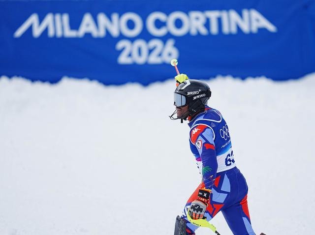 (260216) -- BORMIO, Feb. 16, 2026 (Xinhua) -- Richardson Viano of Haiti reacts after the alpine skiing men's slalom event at the Milan-Cortina 2026 Olympic Winter Games in Bormio, Italy, Feb. 16, 2026. (Xinhua/Yan Linyun)