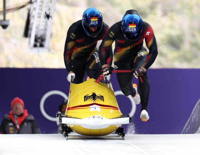 (260216) -- CORTINA D'AMPEZZO, Feb. 16, 2026 (Xinhua) -- Johannes Lochner/Georg Fleischhauer of Germany compete during the bobsleigh 2-man heat 1 at the 2026 Milan-Cortina Winter Olympics in Cortina, Italy, Feb. 15, 2026. (Xinhua/Ding Xu)