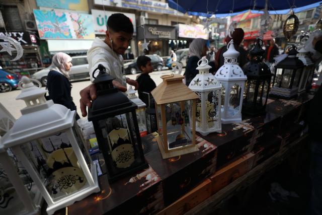 (260216) -- NABLUS, Feb. 16, 2026 (Xinhua) -- Palestinians shop inside a market in the West Bank city of Nablus ahead of Ramadan, Feb. 16, 2026. (Photo by Ayman Nobani/Xinhua)