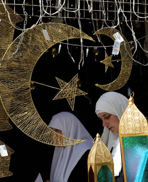 (260216) -- NABLUS, Feb. 16, 2026 (Xinhua) -- Palestinians shop inside a market in the West Bank city of Nablus ahead of Ramadan, Feb. 16, 2026. (Photo by Ayman Nobani/Xinhua)