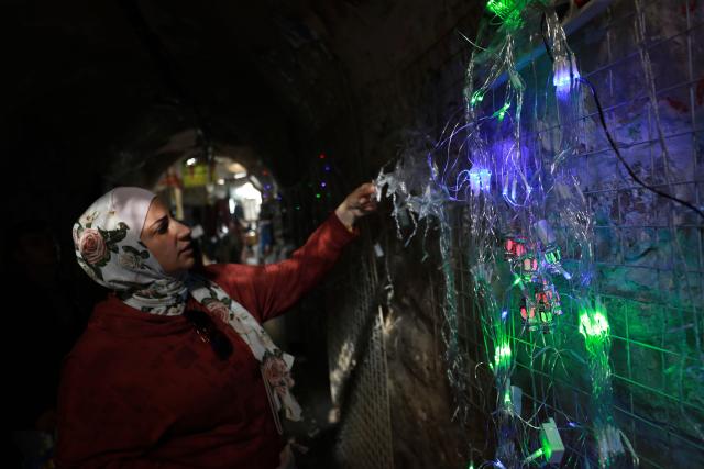 (260216) -- NABLUS, Feb. 16, 2026 (Xinhua) -- A Palestinian woman shops inside a market in the West Bank city of Nablus ahead of Ramadan, Feb. 16, 2026. (Photo by Ayman Nobani/Xinhua)
