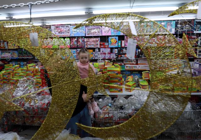 (260216) -- NABLUS, Feb. 16, 2026 (Xinhua) -- Palestinians shop inside a market in the West Bank city of Nablus ahead of Ramadan, Feb. 16, 2026. (Photo by Ayman Nobani/Xinhua)