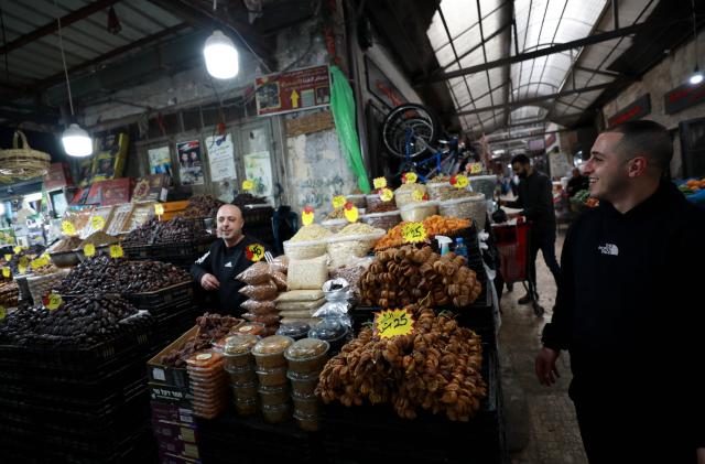 (260216) -- NABLUS, Feb. 16, 2026 (Xinhua) -- Palestinians shop inside a market in the West Bank city of Nablus ahead of Ramadan, Feb. 16, 2026. (Photo by Ayman Nobani/Xinhua)