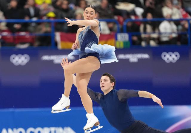 (260216) -- MILAN, Feb. 16, 2026 (Xinhua) -- Anastasia Vaipan-Law (L)/Luke Digby of Britain compete during the figure skating pair skating free skating match at the Milan-Cortina 2026 Olympic Winter Games in Milan, Italy, Feb. 15, 2026. (Xinhua/Xue Yuge)