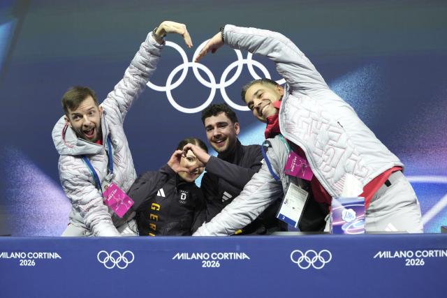 (260216) -- MILAN, Feb. 16, 2026 (Xinhua) -- Annika Hocke (2nd L)/Robert Kunkel (2nd R) of Germany wait for their score during the figure skating pair skating free skating match at the Milan-Cortina 2026 Olympic Winter Games in Milan, Italy, Feb. 15, 2026. (Xinhua/Xue Yuge)