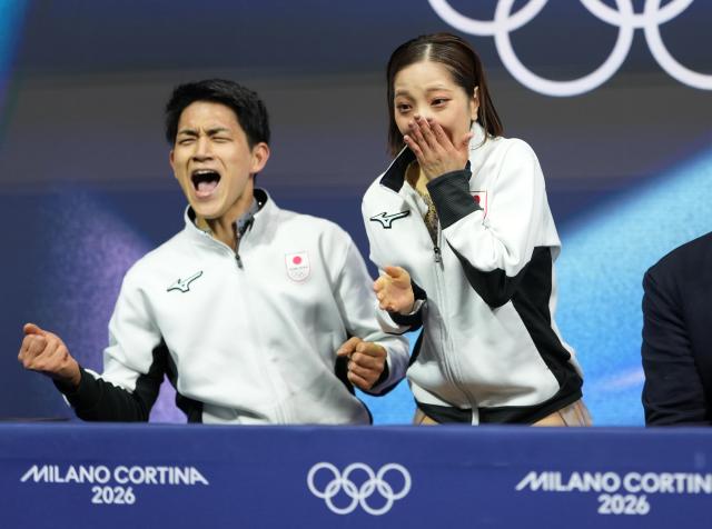 (260217) -- MILAN, Feb. 17, 2026 (Xinhua) -- Riku Miura and Ryuichi Kihara of Japan react in the kiss and cry area after their free skating performance of Figure Skating Pair Skating at the Milan-Cortina 2026 Olympic Winter Games in Milan, Italy, Feb. 16, 2026. (Xinhua/Xue Yuge)