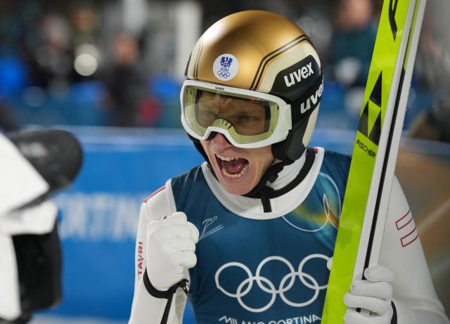 (260217) -- PREDAZZO, Feb. 17, 2026 (Xinhua) -- Jan Hoerl of Austria celebrates after the second round of the ski jumping men's super team event at the Milan-Cortina 2026 Olympic Winter Games in Predazzo, Italy, Feb. 16, 2026. (Xinhua/Meng Yongmin)