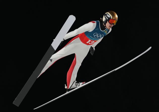 (260217) -- PREDAZZO, Feb. 17, 2026 (Xinhua) -- Johann Andre Forfang of Norway competes during the first round of the ski jumping men's super team event at the Milan-Cortina 2026 Olympic Winter Games in Predazzo, Italy, Feb. 16, 2026. (Xinhua/Meng Yongmin)