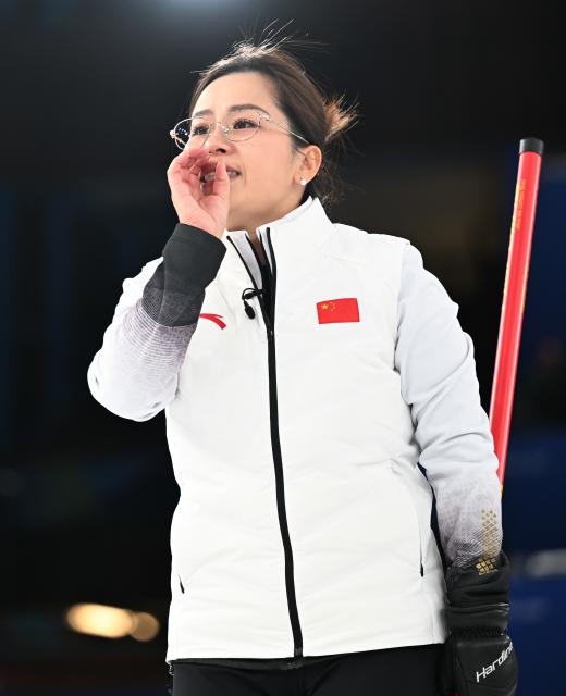 (260217) -- CORTINA D'AMPEZZO, Feb. 17, 2026 (Xinhua) -- Wang Rui of China reacts during the curling women round robin session 8 match between China and South Korea at the Milan-Cortina 2026 Olympic Winter Games in Cortina, Italy, Feb. 16, 2026. (Xinhua/Lian Yi)