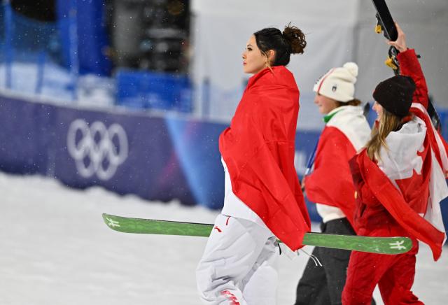 (260217) -- LIVIGNO, Feb. 17, 2026 (Xinhua) -- Silver medalist Gu Ailing (front) of China reacts after the awarding ceremony of the freestyle skiing women's freeski big air event at the Milan-Cortina 2026 Olympic Winter Games in Livigno, Italy, Feb. 16, 2026. (Xinhua/Zhang Hongxiang)