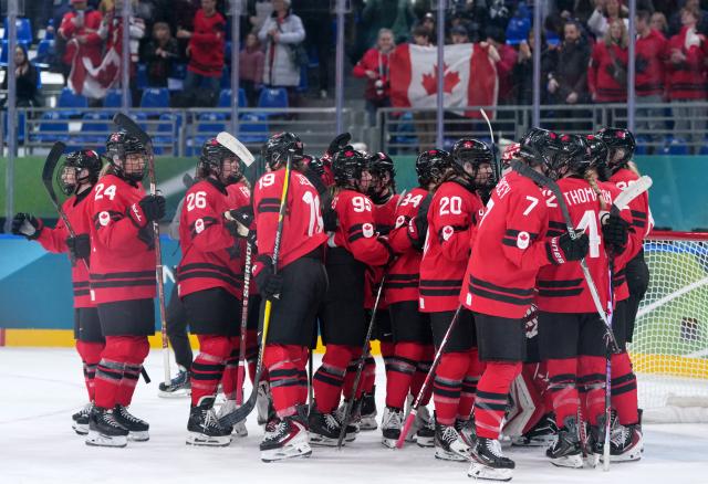 (260217) -- MILAN, Feb. 17, 2026 (Xinhua) -- Players of Canada celebrate after winning the Play-offs Semifinals match between Canada and Switzerland of Ice hockey Women at the Milan-Cortina 2026 Olympic Winter Games in Milan, Italy, Feb. 16, 2026. (Xinhua/Sun Fei)