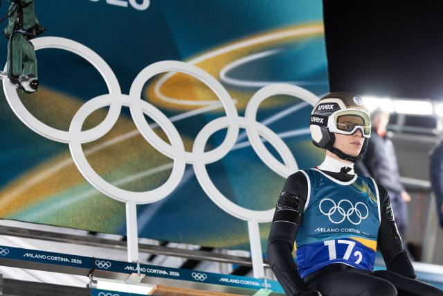(260217) -- PREDAZZO, Feb. 17, 2026 (Xinhua) -- Stephan Embacher of Austria competes during the trial round of the ski jumping men's super team event at the Milan-Cortina 2026 Olympic Winter Games in Predazzo, Italy, Feb. 16, 2026. (Xinhua/Huang Wei)