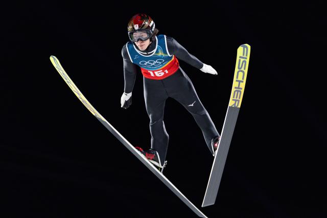 (260217) -- PREDAZZO, Feb. 17, 2026 (Xinhua) -- Nikaido Ren of Japan competes during the second round of the ski jumping men's super team event at the Milan-Cortina 2026 Olympic Winter Games in Predazzo, Italy, Feb. 16, 2026. (Xinhua/Huang Wei)