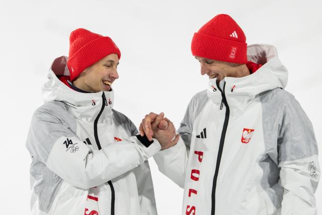 (260217) -- PREDAZZO, Feb. 17, 2026 (Xinhua) -- Silver medalist Team Poland celebrate on the podium after the ski jumping men's super team event at the Milan-Cortina 2026 Olympic Winter Games in Predazzo, Italy, Feb. 16, 2026. (Xinhua/Huang Wei)