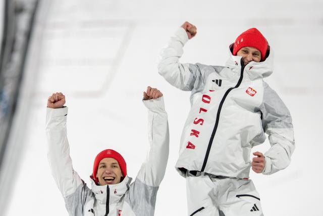 (260217) -- PREDAZZO, Feb. 17, 2026 (Xinhua) -- Silver medalist Team Poland celebrate on the podium after the ski jumping men's super team event at the Milan-Cortina 2026 Olympic Winter Games in Predazzo, Italy, Feb. 16, 2026. (Xinhua/Huang Wei)