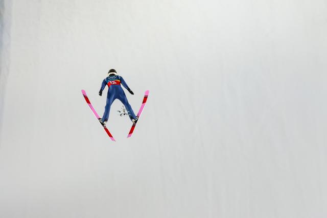 (260217) -- PREDAZZO, Feb. 17, 2026 (Xinhua) -- Pawel Wasek of Poland competes during the trial round of the ski jumping men's super team event at the Milan-Cortina 2026 Olympic Winter Games in Predazzo, Italy, Feb. 16, 2026. (Xinhua/Huang Wei)