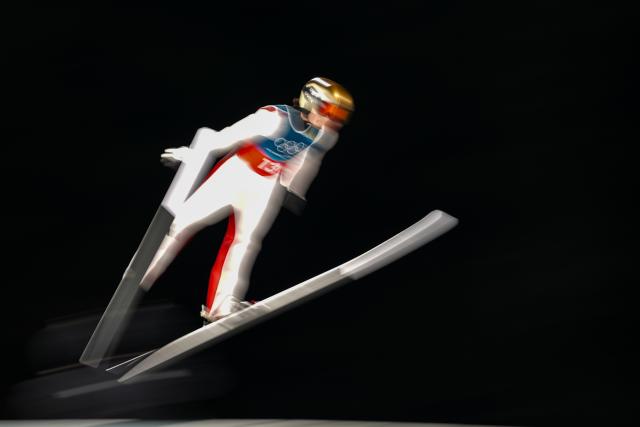 (260217) -- PREDAZZO, Feb. 17, 2026 (Xinhua) -- Johann Andre Forfang of Norway competes during the first round of the ski jumping men's super team event at the Milan-Cortina 2026 Olympic Winter Games in Predazzo, Italy, Feb. 16, 2026. (Xinhua/Huang Wei)