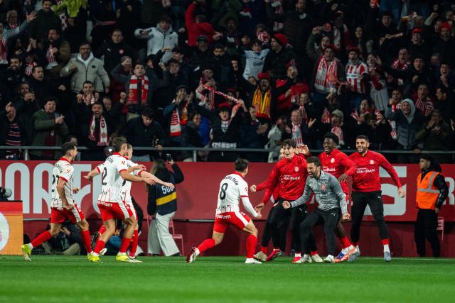 (260217) -- GIRONA, Feb. 17, 2026 (Xinhua) -- Players of Girona celebrate scoring during the La Liga football match between Girona FC and FC Barcelona in Girona, Spain, Feb. 16, 2026. (Photo by Joan Gosa/Xinhua)