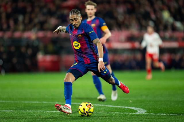 (260217) -- GIRONA, Feb. 17, 2026 (Xinhua) -- Raphinha of Barcelona shoots during the La Liga football match between Girona FC and FC Barcelona in Girona, Spain, Feb. 16, 2026. (Photo by Joan Gosa/Xinhua)