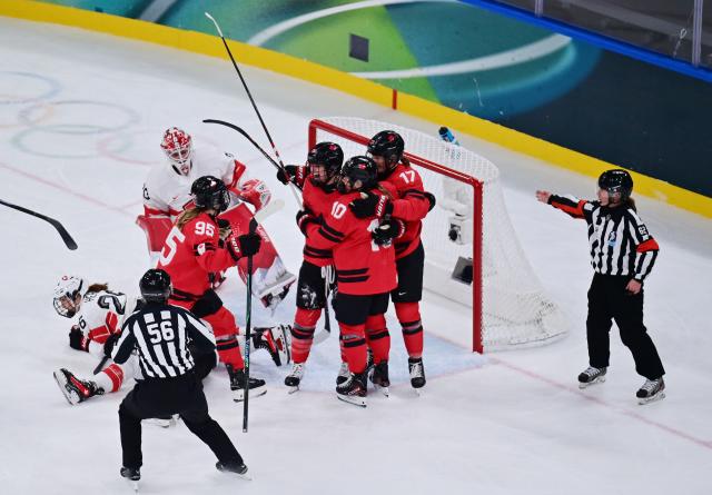 (260217) -- MILAN, Feb. 17, 2026 (Xinhua) -- Canada's players celebrate Marie-Philip Poulin's goal during the Play-offs Semifinals match between Canada and Switzerland of Ice hockey Women at the Milan-Cortina 2026 Olympic Winter Games in Milan, Italy, Feb. 16, 2026. (Xinhua/Tao Xiyi)