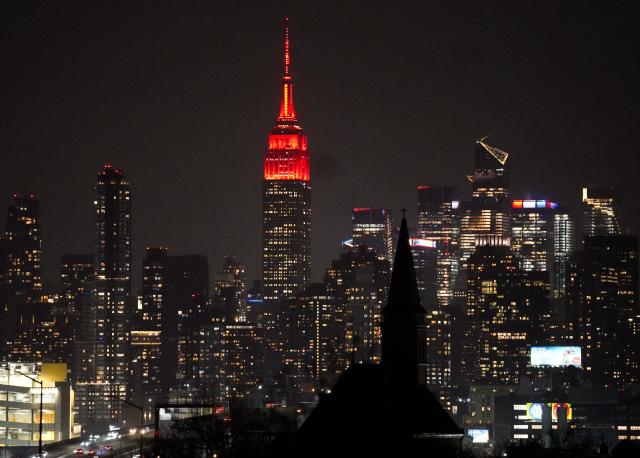 (260217) -- NEW YORK, Feb. 17, 2026 (Xinhua) -- The Empire State Building is lit up in red to celebrate the Chinese New Year in New York City, the United States, Feb. 16, 2026. (Xinhua/Zhang Fengguo)