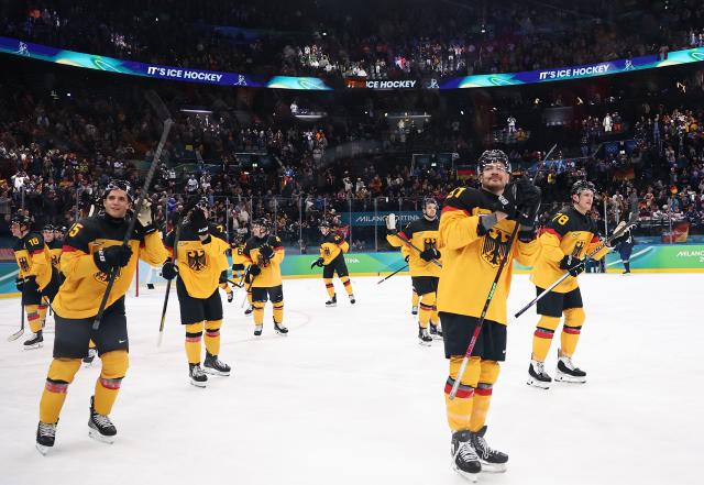 (260217) -- MILAN, Feb. 17, 2026 (Xinhua) -- Players of Germany react after the ice hockey men's qualification play-off match between Germany and France at the Milan-Cortina 2026 Olympic Winter Games in Milan, Italy, Feb. 17, 2026. (Xinhua/Wang Kaiyan)