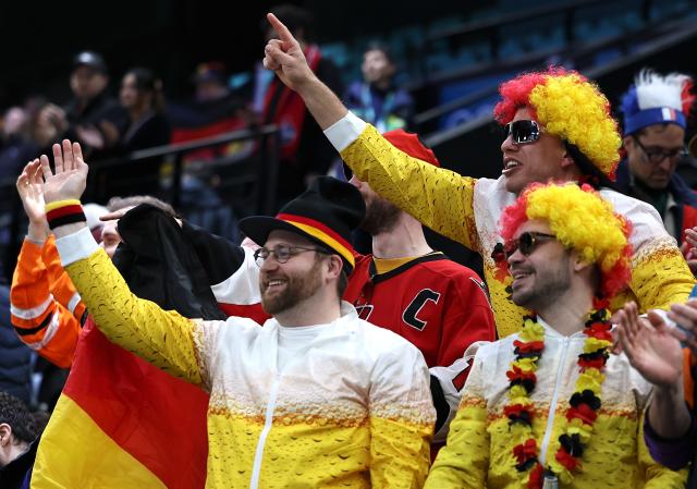 (260217) -- MILAN, Feb. 17, 2026 (Xinhua) -- Fans of Germany cheer after the ice hockey men's qualification play-off match between Germany and France at the Milan-Cortina 2026 Olympic Winter Games in Milan, Italy, Feb. 17, 2026. (Xinhua/Wang Kaiyan)