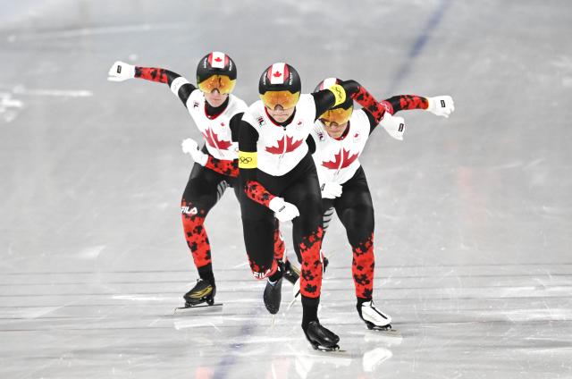 (260217) -- MILAN, Feb. 17, 2026 (Xinhua) -- Isabelle Weidemann, Valerie Maltais and Ivanie Blondin of Canada compete during the speed skating women's team pursuit semifinal between the United States and Canada at the Milan-Cortina 2026 Olympic Winter Games in Milan, Italy, Feb. 17, 2026. (Xinhua/Wu Wei)