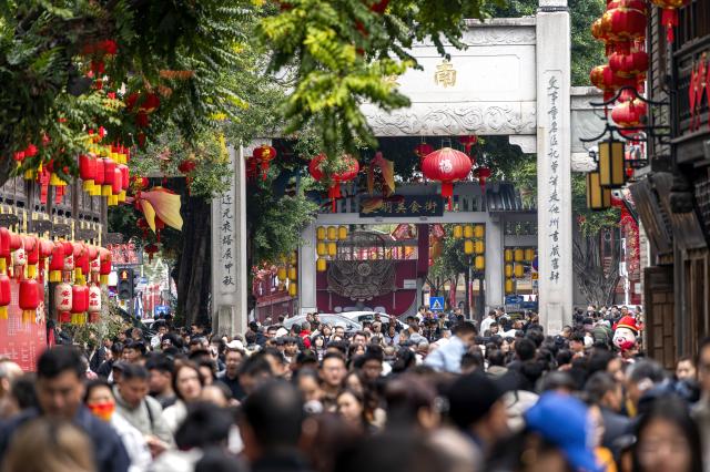 (260217) -- FUZHOU, Feb. 17, 2026 (Xinhua) -- People visit Sanfangqixiang (Three Lanes and Seven Alleys) area on the first day of the Chinese New Year in Fuzhou, southeast China's Fujian Province, Feb. 17, 2026. (Xinhua/Wei Peiquan)