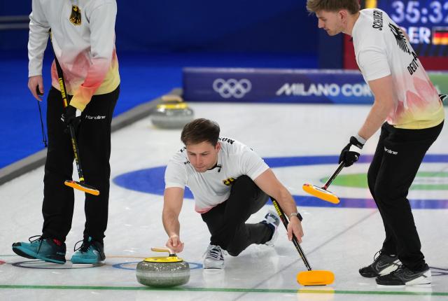 (260217) -- CORTINA D'AMPEZZO, Feb. 17, 2026 (Xinhua) -- Marc Muskatewitz (C) of Germany competes during the curling men's round robin session 9 match between Germany and the Czech Republic at the 2026 Milan-Cortina Winter Olympics in Cortina, Italy, Feb. 17, 2026. (Xinhua/Li Gang)