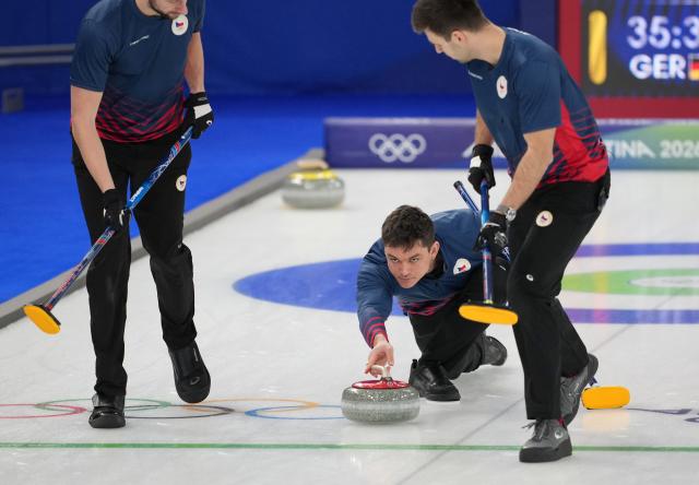 (260217) -- CORTINA D'AMPEZZO, Feb. 17, 2026 (Xinhua) -- Lukas Klima (C) of the Czech Republic competes during the curling men's round robin session 9 match between Germany and the Czech Republic at the 2026 Milan-Cortina Winter Olympics in Cortina, Italy, Feb. 17, 2026. (Xinhua/Li Gang)