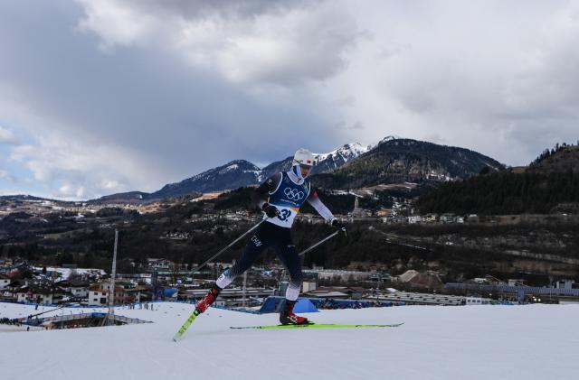 (260217) -- TESERO, Feb. 17, 2026 (Xinhua) -- Zhao Zihe of China competes during the cross-country event of Nordic Combined Individual Gundersen Large Hill/10km at the Milan-Cortina 2026 Olympic Winter Games in Tesero, Italy, Feb. 17, 2026. (Xinhua/Peng Ziyang)