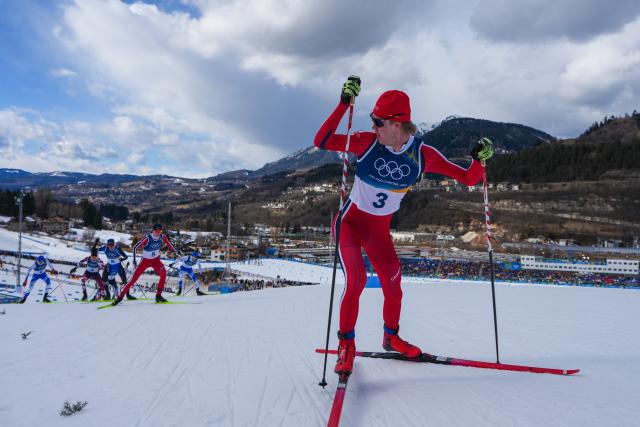 (260217) -- TESERO, Feb. 17, 2026 (Xinhua) -- Andreas Skoglund (front) of Norway competes during the cross-country event of Nordic Combined Individual Gundersen Large Hill/10km at the Milan-Cortina 2026 Olympic Winter Games in Tesero, Italy, Feb. 17, 2026. (Xinhua/Peng Ziyang)
