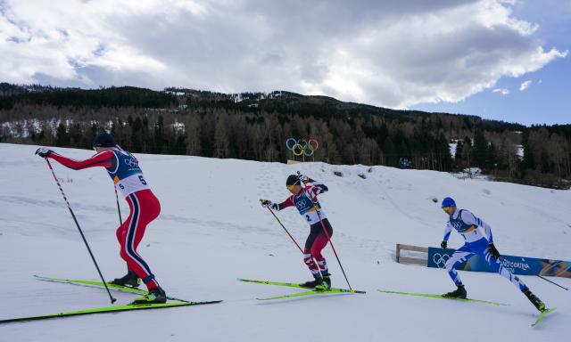 (260217) -- TESERO, Feb. 17, 2026 (Xinhua) -- Jens Luraas Oftebro of Norway, Johannes Lamparter of Austria and Ilkka Herola of Finland (L-R) compete during the cross-country event of Nordic Combined Individual Gundersen Large Hill/10km at the Milan-Cortina 2026 Olympic Winter Games in Tesero, Italy, Feb. 17, 2026. (Xinhua/Peng Ziyang)