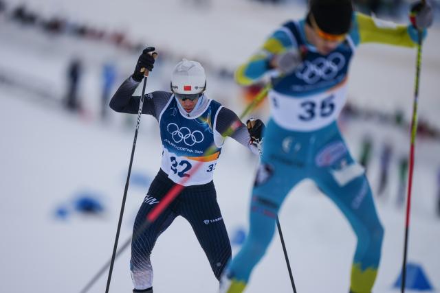 (260217) -- TESERO, Feb. 17, 2026 (Xinhua) -- Zhao Zihe of China competes during the cross-country event of Nordic Combined Individual Gundersen Large Hill/10km at the Milan-Cortina 2026 Olympic Winter Games in Tesero, Italy, Feb. 17, 2026. (Xinhua/Peng Ziyang)