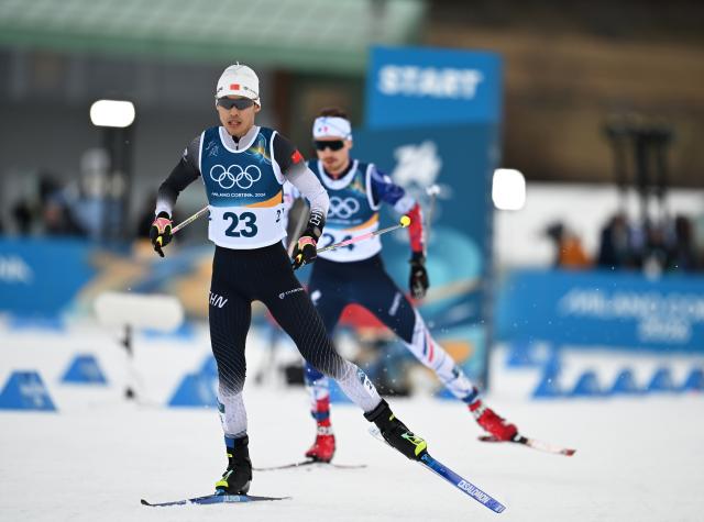 (260217) -- TESERO, Feb. 17, 2026 (Xinhua) -- Zhao Jiawen of China competes during the cross-country event of Nordic Combined Individual Gundersen Large Hill/10km at the Milan-Cortina 2026 Olympic Winter Games in Tesero, Italy, Feb. 17, 2026. (Xinhua/He Canling)