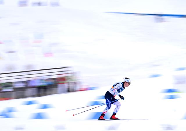 (260217) -- TESERO, Feb. 17, 2026 (Xinhua) -- Marco Heinis of France competes during the cross-country event of Nordic Combined Individual Gundersen Large Hill/10km at the Milan-Cortina 2026 Olympic Winter Games in Tesero, Italy, Feb. 17, 2026. (Xinhua/He Canling)