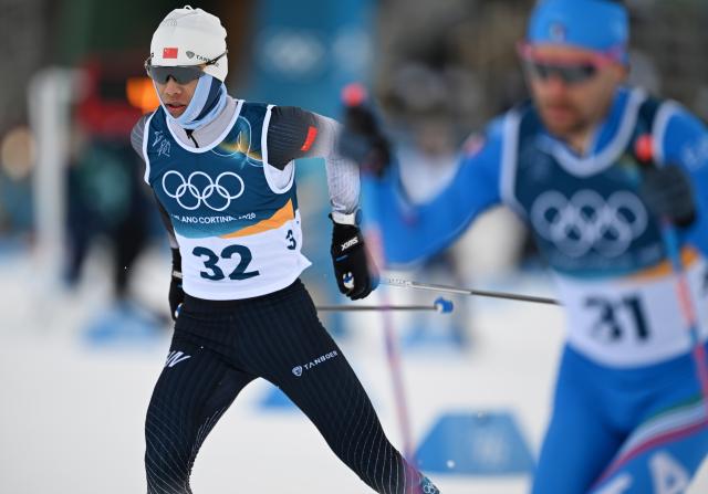 (260217) -- TESERO, Feb. 17, 2026 (Xinhua) -- Zhao Zihe of China competes during the cross-country event of Nordic Combined Individual Gundersen Large Hill/10km at the Milan-Cortina 2026 Olympic Winter Games in Tesero, Italy, Feb. 17, 2026. (Xinhua/He Canling)