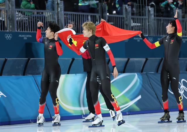 (260217) -- MILAN, Feb. 17, 2026 (Xinhua) -- Liu Hanbin, Wu Yu, Li Wenhao and Ning Zhongyan of China celebrate after the speed skating men's team pursuit final B between China and the Netherlands at the Milan-Cortina 2026 Olympic Winter Games in Milan, Italy, Feb. 17, 2026. (Xinhua/Li Jing)