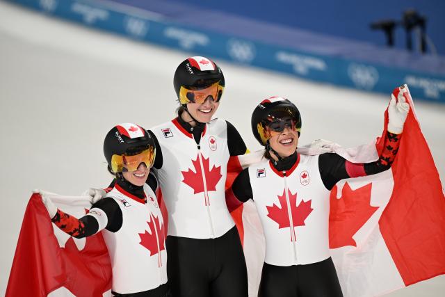 (260217) -- MILAN, Feb. 17, 2026 (Xinhua) -- Ivanie Blondin (L), Valerie Maltais (R) and Isabelle Weidemann of Canada celebrate after the speed skating women's team pursuit final A between Canada and the Netherlands at the Milan-Cortina 2026 Olympic Winter Games in Milan, Italy, Feb. 17, 2026. (Xinhua/Wu Wei)