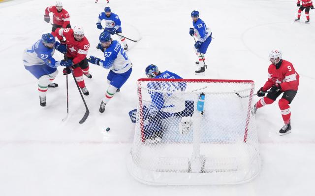 (260217) -- MILAN, Feb. 17, 2026 (Xinhua) -- Timo Meier (2nd L, front) of Switzerland during the ice hockey men's qualification play-off match between Switzerland and Italy at the Milan-Cortina 2026 Olympic Winter Games in Milan, Italy, Feb. 17, 2026. (Xinhua/Tao Xiyi)