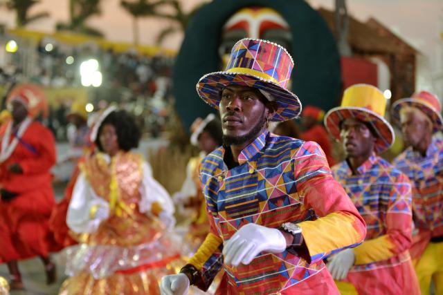 (260217) -- LUANDA, Feb. 17, 2026 (Xinhua) -- Photo taken on Feb. 16, 2026 shows performers taking part in the parade of the Luanda Carnival 2026 in Luanda, Angola. Thirteen top carnival groups turned Luanda's Nova Marginal into a vibrant stage of music, dance, and national pride on Monday as the Angolan capital hosted the main parade of the Luanda Carnival. (Photo by Julio Kikebu/Xinhua)