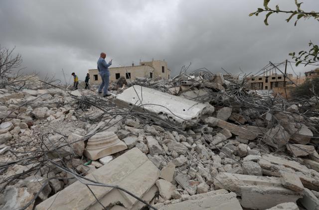 (260217) -- NABLUS, Feb. 17, 2026 (Xinhua) -- Palestinians inspect damage after Israeli excavators demolished a house in Nablus in the northern West Bank, on Feb. 17, 2026. (Photo by Ayman Nobani/Xinhua)
