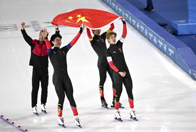 (260217) -- MILAN, Feb. 17, 2026 (Xinhua) -- Liu Hanbin, Wu Yu, Li Wenhao and Ning Zhongyan of China celebrate after the speed skating men's team pursuit final B between China and the Netherlands at the Milan-Cortina 2026 Olympic Winter Games in Milan, Italy, Feb. 17, 2026. (Xinhua/Wu Wei)