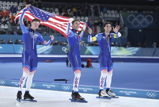 (260217) -- MILAN, Feb. 17, 2026 (Xinhua) -- Ethan Cepuran (L), Casey Dawson (C) and Emery Lehman of the United States celebrate after the speed skating men's team pursuit final A between Italy and the United States at the Milan-Cortina 2026 Olympic Winter Games in Milan, Italy, Feb. 17, 2026. (Xinhua/Du Xiaoyi)