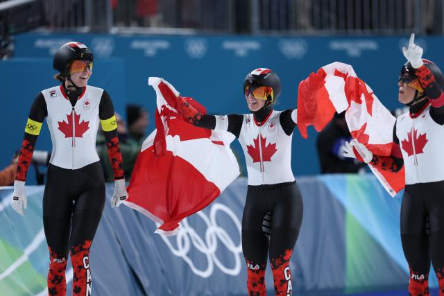 (260217) -- MILAN, Feb. 17, 2026 (Xinhua) -- Ivanie Blondin (C), Valerie Maltais (R) and Isabelle Weidemann of Canada celebrate after the speed skating women's team pursuit final A between Canada and the Netherlands at the Milan-Cortina 2026 Olympic Winter Games in Milan, Italy, Feb. 17, 2026. (Xinhua/Du Xiaoyi)