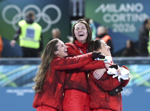 (260217) -- MILAN, Feb. 17, 2026 (Xinhua) -- Gold medalists Ivanie Blondin, Valerie Maltais and Isabelle Weidemann of Canada celebrate during the awarding ceremony of the speed skating women's team pursuit event at the Milan-Cortina 2026 Olympic Winter Games in Milan, Italy, Feb. 17, 2026. (Xinhua/Li Jing)
