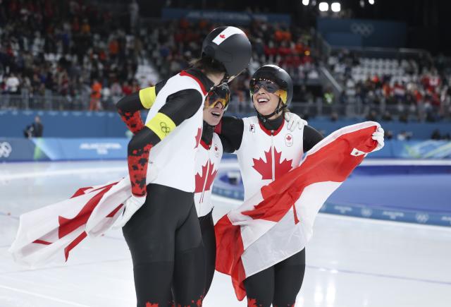 (260217) -- MILAN, Feb. 17, 2026 (Xinhua) -- Ivanie Blondin (C), Valerie Maltais (R) and Isabelle Weidemann of Canada celebrate after the speed skating women's team pursuit final A between Canada and the Netherlands at the Milan-Cortina 2026 Olympic Winter Games in Milan, Italy, Feb. 17, 2026. (Xinhua/Du Xiaoyi)
